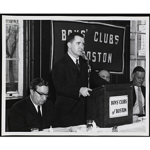 A man speaking at the podium during a Boys' Clubs of Boston awards event