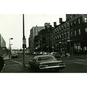 Cars line a street in Boston's Chinatown