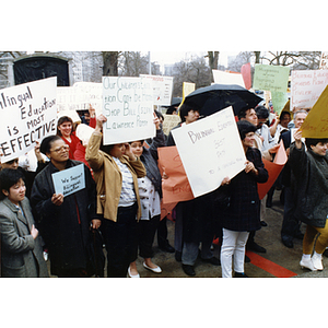 Demonstrators participate in a rally for bilingual education in schools at the Massachusetts State House