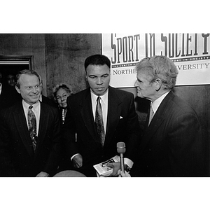 Muhammad Ali speaking with President Curry