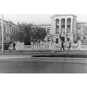 Northeastern Band marches past the Museum of Fine Arts as it parades down Huntington Avenue
