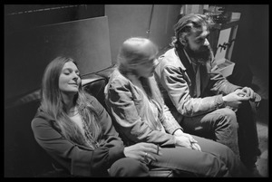 Judy Collins, Joni Mitchell, and unidentified man seated on a couch in Wally Heider Studio 3 during production of the first Crosby, Stills, and Nash album