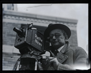 Dick Sears, Pathe News Service, with camera