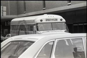 Free Spirit Press bus driving down Springfield city streets