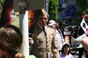 Older Marine in uniform during the protest against the war in Iraq