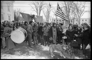 Protesters, including Elliot Blinder and Catherine Blinder, lining up during a demonstration against the invasion of Laos at the Vermont State House