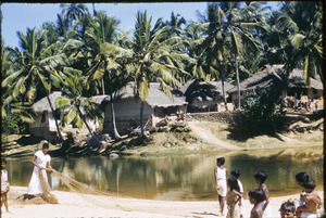 Preparing a fishing net in a Keralan village