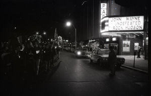 Young Americans for Freedom pro-Vietnam War demonstration, Boston Common: Crowd in front of movie theater showing John Wayne's Undefeated