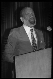 Speaker at the podium for James Baldwin's birthday celebration