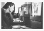 A NESAD student works at a computer at Suffolk University, photograph, circa 2003