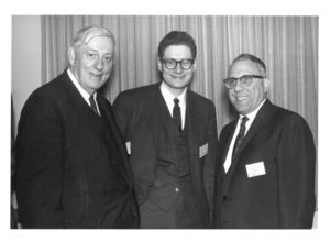 Dean Donald Goodrich (CAS), Peter Volpe and another man at a Suffolk University Advisory Council meeting