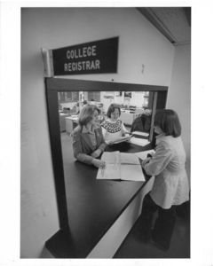 A Suffolk University student visits the registrar's office