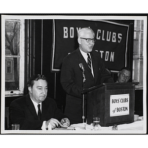 Thomas J. Curtin speaking at the podium during a Boys' Clubs of Boston awards event