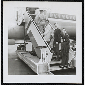 Three members of the Keystone Club boarding their flight