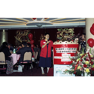 Lydia Lowe addresses crowd during Chinese Progressive Association's 20th Anniversary Celebration