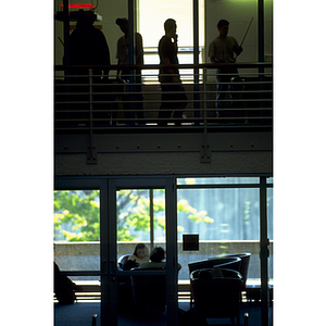 Students studying and playing pool inside the Curry Student Center