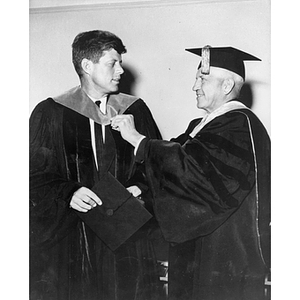 Senator John F. Kennedy receives honorary Doctor of Laws hood