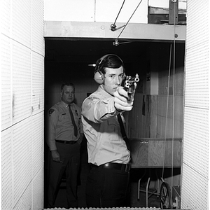 A Criminal Justice student practices at the Lexington Police Department firing range during his co-op