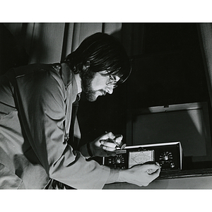 Phillip Thompson using Geiger counter
