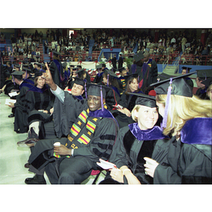 School of Law graduates talking at commencement