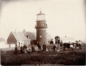 Exterior view of Gay Head Lighthouse with tourists and an ox-cart, Martha's Vineyard, Mass., 1887