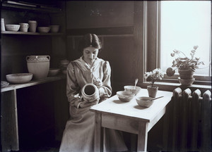 Girl coloring vase, Paul Revere Pottery, 18 Hull Street, North End, Boston, Mass.