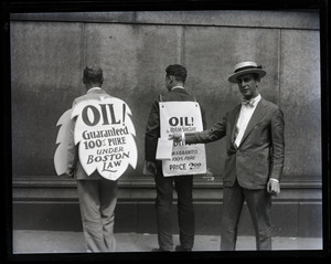 Upton Sinclair and supporters (including son David?) protesting at censorship hearings for his novel Oil!: showing back side of sandwich boards protesting censorship