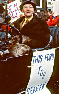 Reagan supporter in an antique car