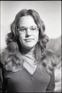 Half-length studio portrait of Carol Evans