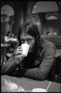 Charlie Ribokas, seated at a table