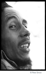 Bob Marley: close-up portrait looking back toward the camera