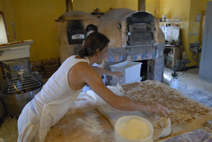 Hungry Ghost Bread: owner and baker Jonathan C. Stevens working on cinnamon rolls