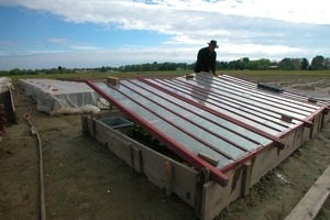 Lazy Acres Farm (Zuchowski Farm): Allan Zuchowski tending cold frames