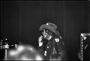 Grateful Dead performing at the Music Hall: Ron 'pigpen' McKernan smoking a cigarette onstage
