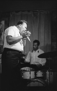 James Cotton at Club 47: James Cotton playing harmonica with Francis Clay playing drums at right