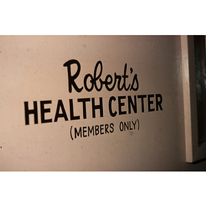 Sign that reads "Robert's health center (members only)"