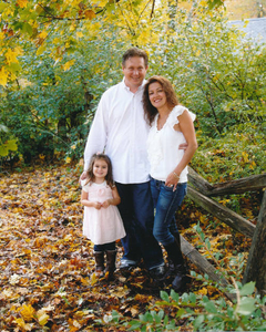 Fall family photo at sheep pasture