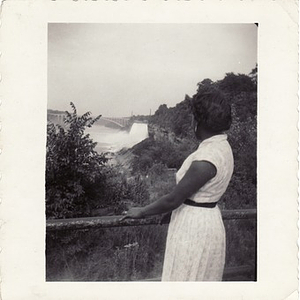 Inez Irving Hunter stands at a scenic overlook