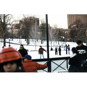 Villa Victoria residents and others skating on Frog Pond.