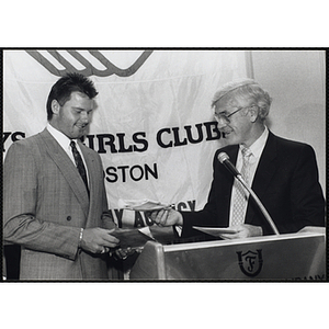 Boston Red Sox Roger Clemens receives an award during an event held by the Boys and Girls Clubs of Boston