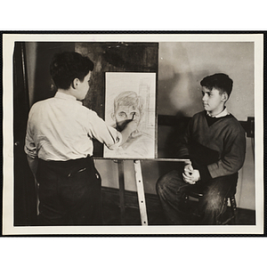 A boy sketching another boy for an art class at the Boys' Clubs of Boston