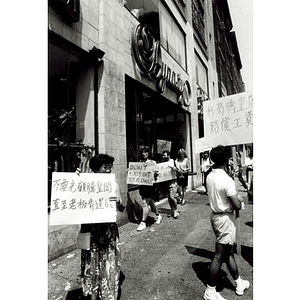 Demonstrators picketing outside Dynasty Restaurant to get back wages for workers