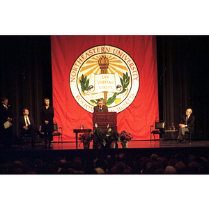 Lech Walesa speaks on stage at the inauguration of the International Degree Program