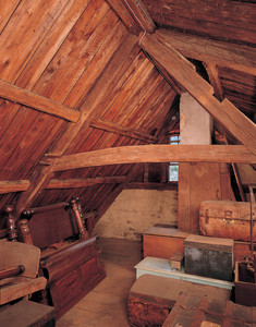 Attic showing stored trunks and furniture, Coffin House, Newbury, Mass.