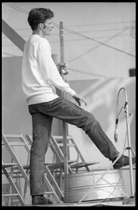 Fritz Richmond on stage, playing washtub bass, Newport Folk Festival