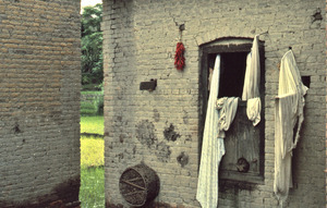 Laundry hanging by a window