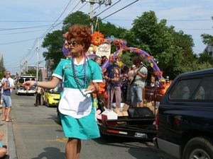 Parade marcher dressed as a waitress : Provincetown Carnival parade