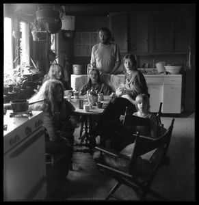 Commune members gathered in the kitchen of the Brotherhood of the Spirit dormitory in Warwick, Mass.