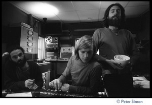Amazing Grace in the recording studio, working at the mixing board (Krishna Das at right)