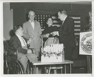 Bruce Barton with unidentified man handing diplomas to clients at Institute Day